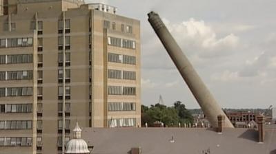 Archive footage captures the moment a controlled explosion changed a city's skyline forever.