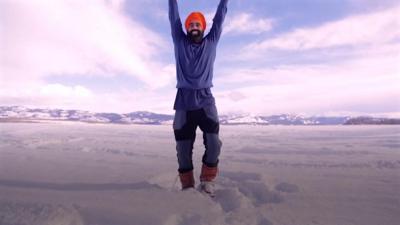 A man doing a Bhangra dance on ice.