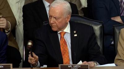 Senator Orrin Hatch slams a gavel