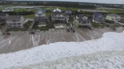 Rising tide approaches coastal homes