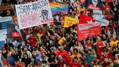 Pro-democracy demonstrators march in Porto Alegre, Brazil