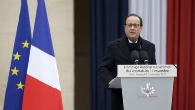 President Francois Hollande delivers a speech during a ceremony to pay a national homage to the victims of the Paris attacks