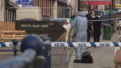 Forensic officers at the scene