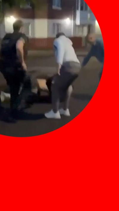 Screengrab from aftermath video showing bystanders hitting alleged attacker