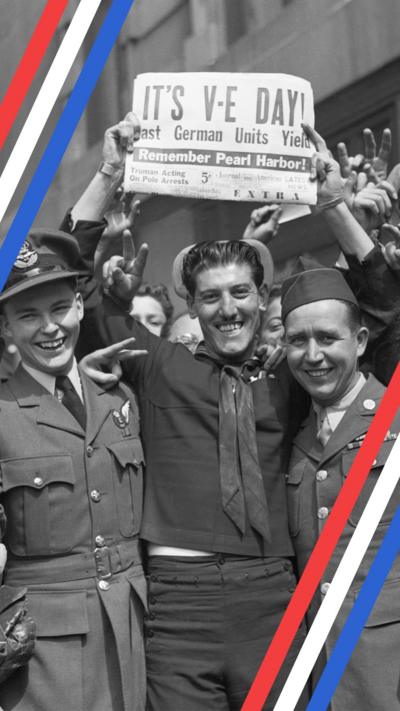 A black and white photo of a man surrounded by soldiers, holding a newspaper with the headline 'it's VE Day'