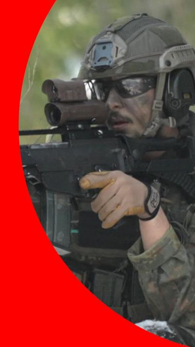 A soldier pointing a gun