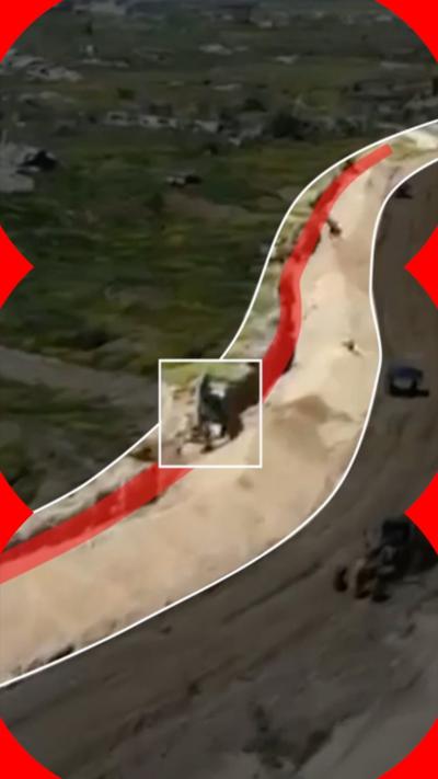 An image from above showing a high earth wall in Gaza. It has been highlighted with red and white lines, and a white box showing a particular area of interest.