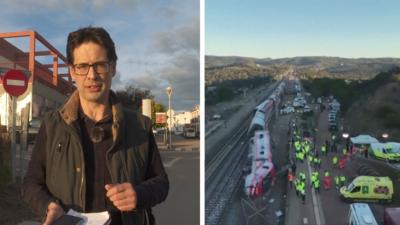 A split screen image. On the left, BBC reporter Guy Hedgecoe. On the right, an aerial view of a train crash in Spain.
