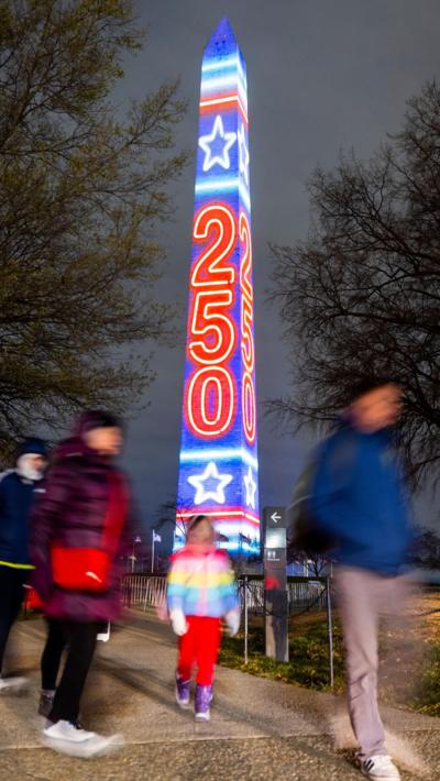 The Washington Monument lit up with '250'