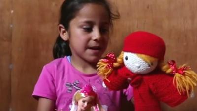 Rouaa and her doll