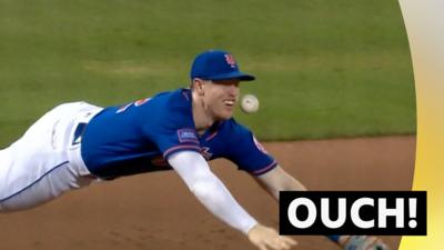 New York Met's Brett Baty makes a painful misfield in their game against the Los Angeles Dodgers.