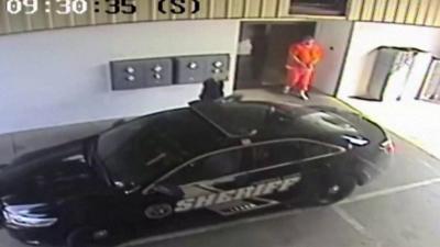 CCTV footage of guard and inmate escaping