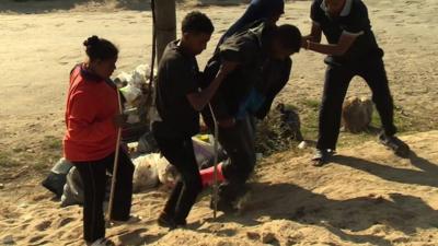 Migrants at the camp known as 'The Jungle' in Calais