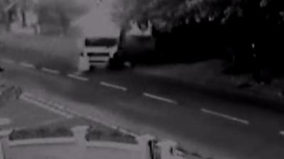 Lorry driving along road