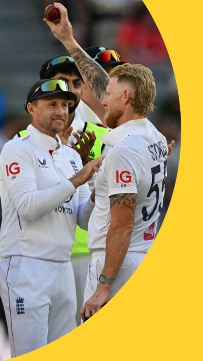 Ben Stokes holds up a cricket ball