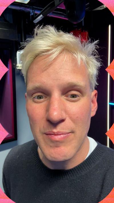 Jamie Laing with his short blond hair and a grey jumper.