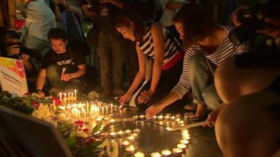 Candles lit for victims of Bangkok blast