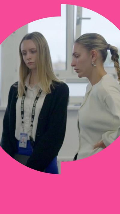 Zara McDermott in side profile stands next to police detective with long blonde hair.