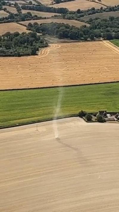 Screengrab taken from a video issued by Air Ambulance Charity Kent Surrey Sussex (KSS) taken by one of their crews of a 'dust devil' caused by the hot weather 