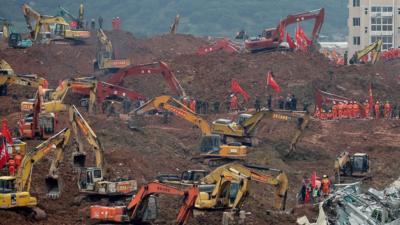 Diggers at the site