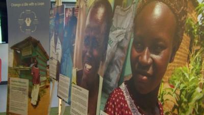 Display boards featuring African men and women