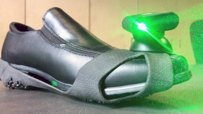 Shoe with laser attached