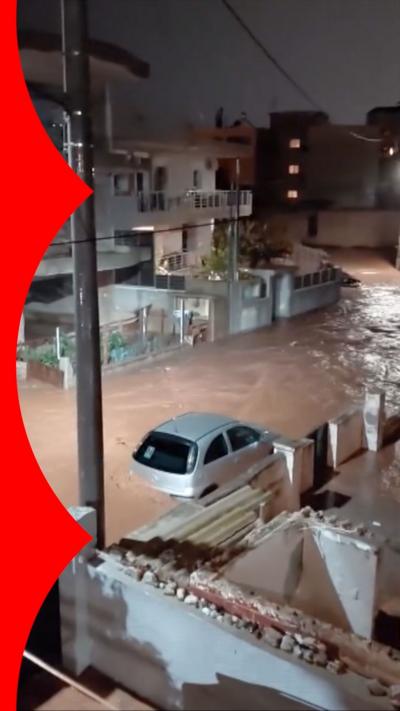A car swamped by flood water