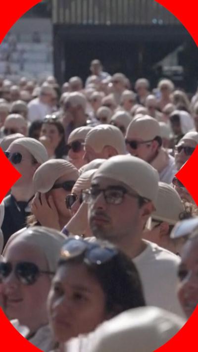 Pitbull fans in bald caps 