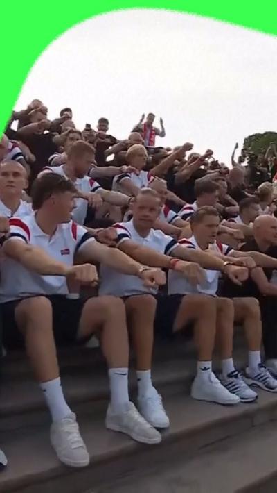 The Norwegian World Cup squad lead a 'Viking row' celebration at their homecoming in Oslo