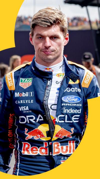 Max Verstappen in Red Bull race suit looking glum 