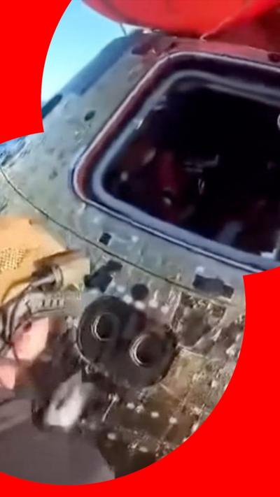 Orion capsule hatch is opened after splashdown