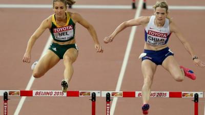 Britain's Eilidh Child competing in her 400m hurdles World Championship Semi-final alongside South Africa's Wenda Nel.