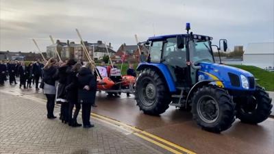 Large crowds gather to say a final goodbye to Steve Medcalf at the lifeboat station in Withernsea.