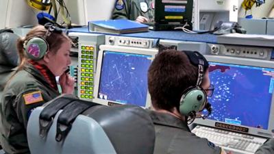 Staff work on a Nato spy plane