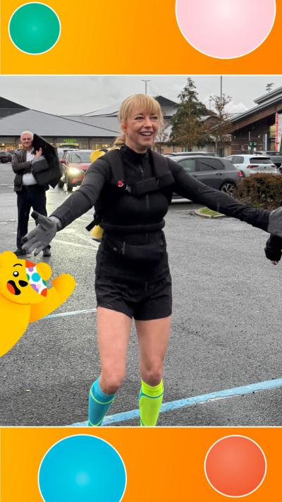 Sara poses at the start line of Day 2 of her challenge.