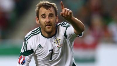 Niall McGinn celebrates scoring against Hungary