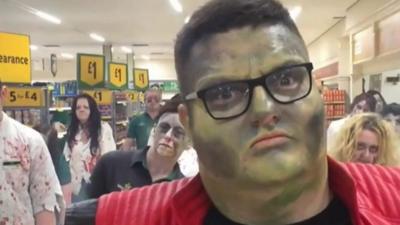 Supermarket worker dressed as Michael Jackson