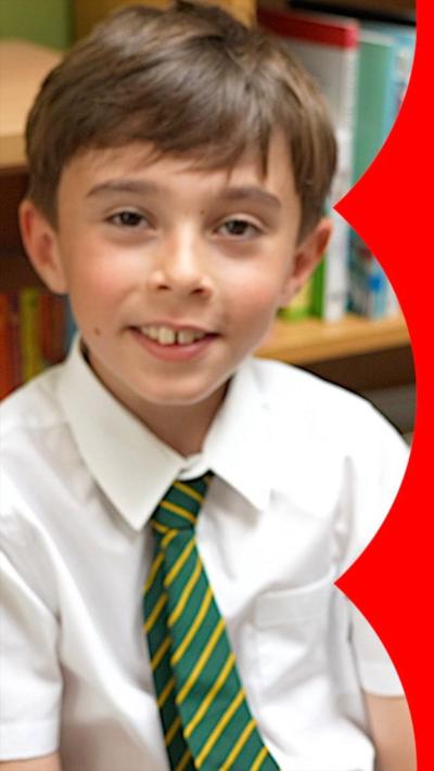 Child in school uniform smiling