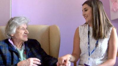 Young people are giving up their time to provide comfort for care home residents living with dementia.