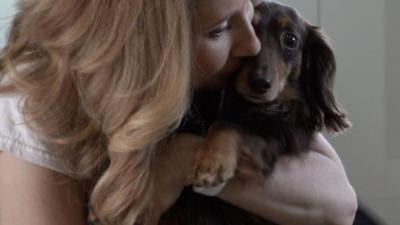 Lucy with a dachshund