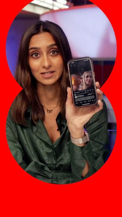 BBC Verify's Reha Kansara holds a phone, she has long dark brown hair and wears a green shirt.