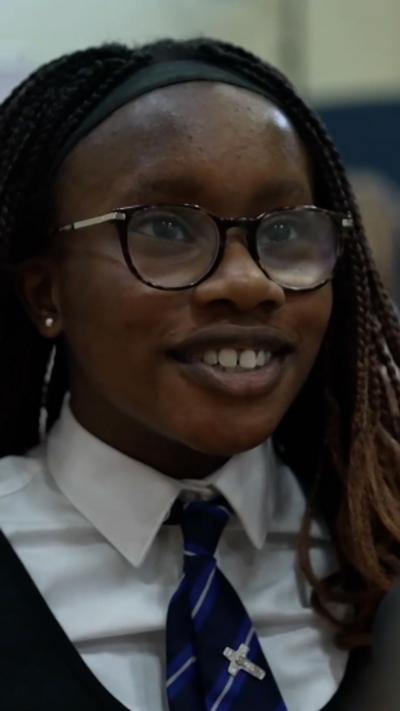School pupil involved in first aid training 