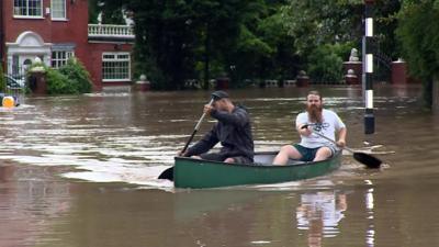 Men in a canoe