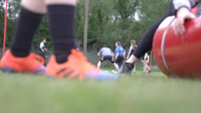 People playing rugby