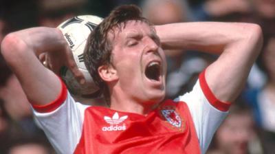 Joey Jones in action for Wales