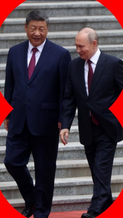 President Xi Jinping and Vladimir Putin walking side by side