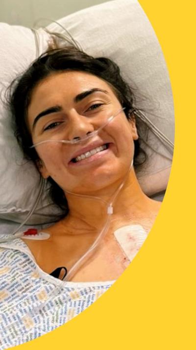 Emma Wassell in a hospital bed