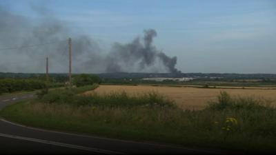 Plumes of smoke from the factory fire