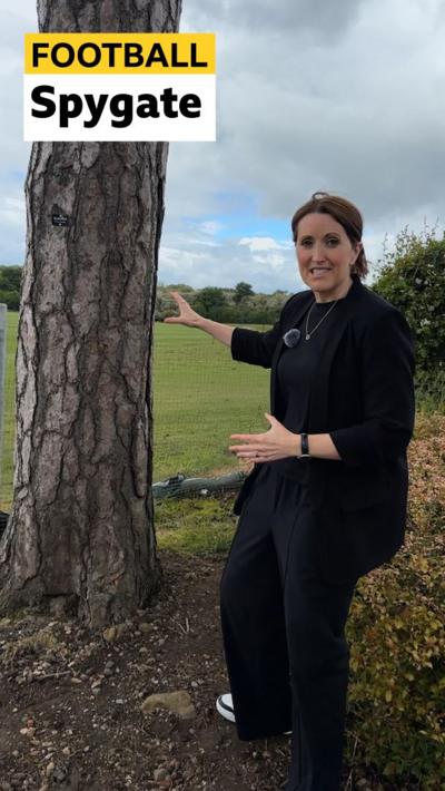 Katie Gornall at Middlesbrough's training ground behind a tree