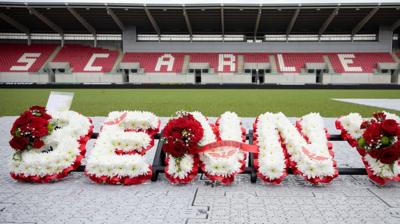 A floral tribute to Phil Bennett at the merorial service in Llanelli